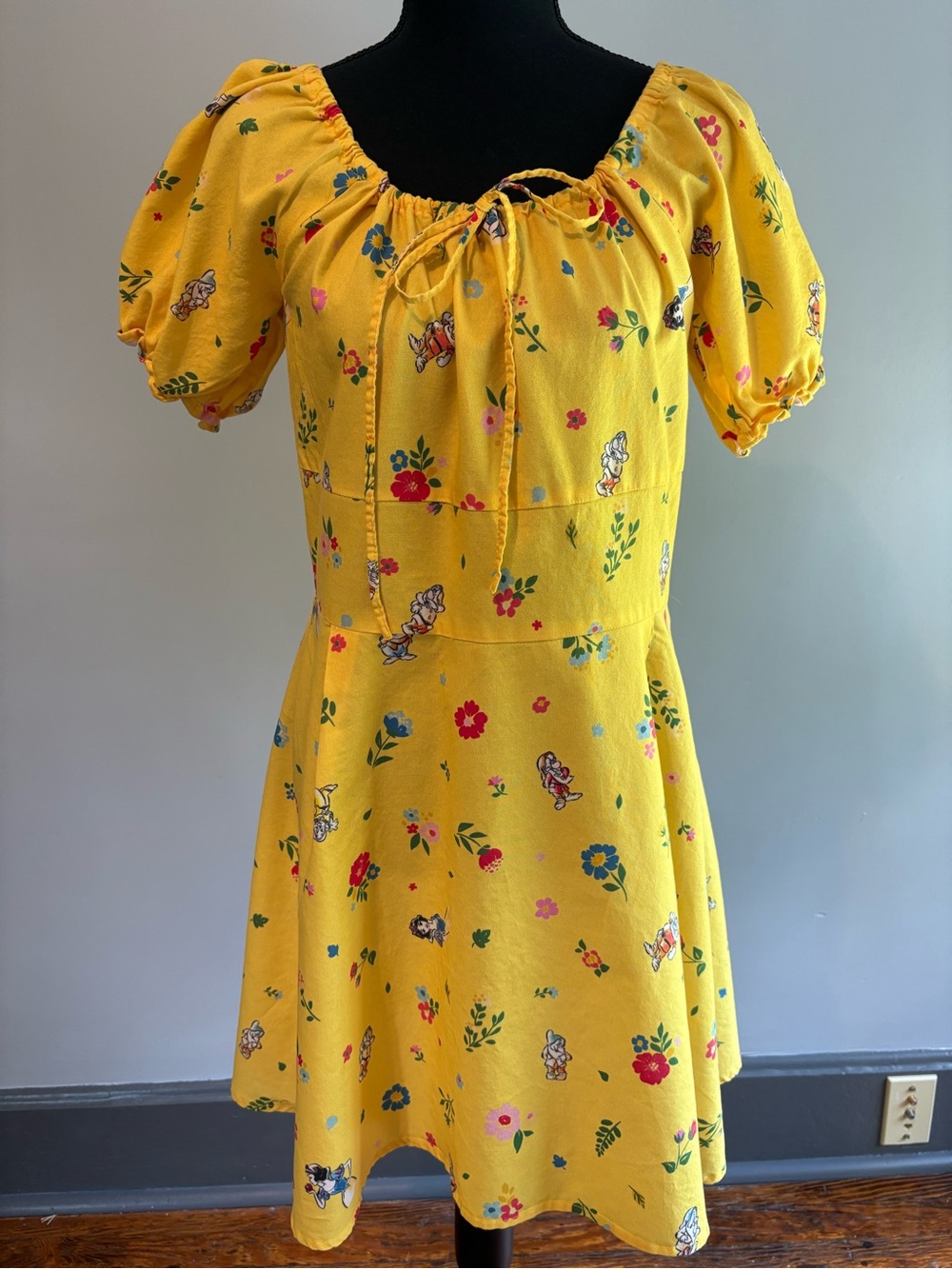 Disney/Cakeworthy Snow White Yellow Floral Tie-Neck Midi Dress.